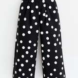 Polka dot pants in black